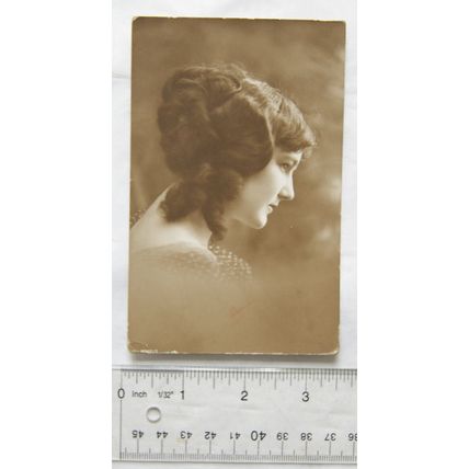 1916 postcard Young Lady facing right