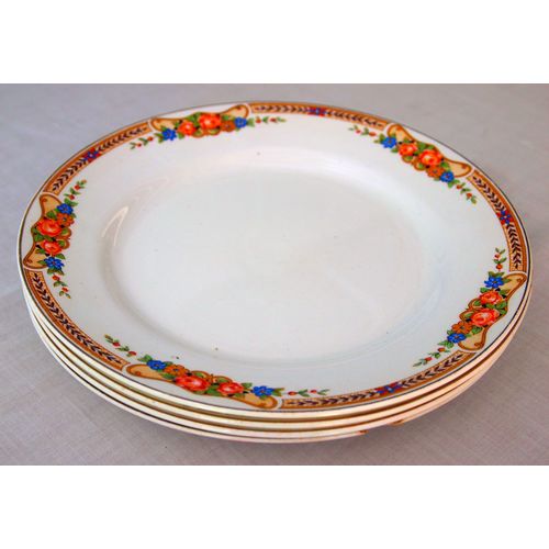 Four side plates circa 1920 with Grecian floral pattern 9 inch diameter