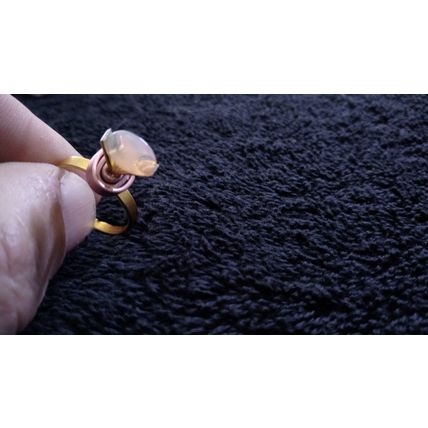 Ethiopian Welo Fire opal and set in gold anodized aluminum setting