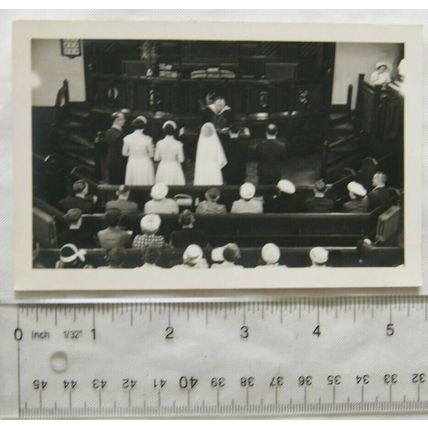 Vintage photo - wedding service in progress taken from the rear