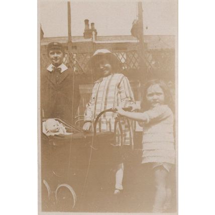 Giant Toy Doll Dolly in Pram Antique Real Photo Postcard