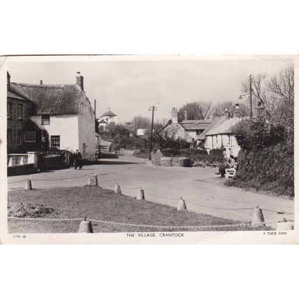 EC296 CRANTOCK - THE VILLAGE. R/P TUCK POSTCARD