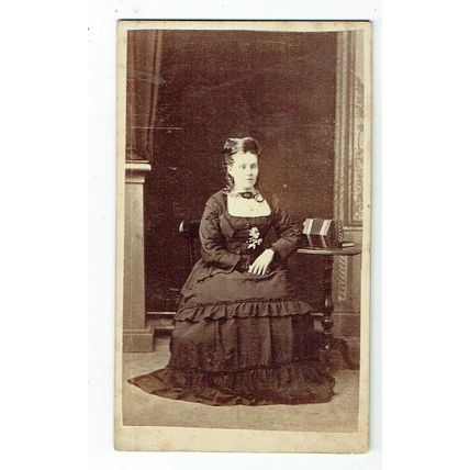 Victorian cdv photo young woman seated by accordion unstated photographer