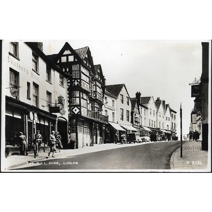 Ludlow, Shropshire - Bull Ring, shops, cars - Valentine RP postcard c.1950s