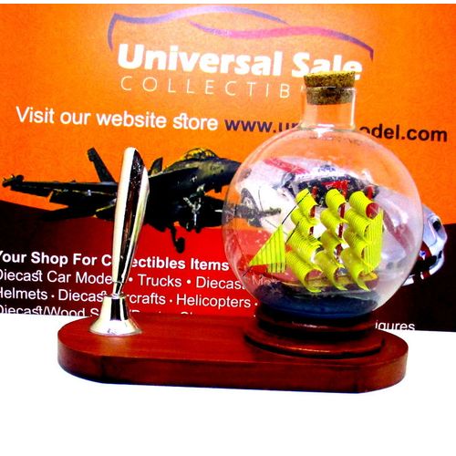 LITTLE SAILING BOAT IN A GLASS BALL ON WOOD PEN STAND,WOODEN NAUTICAL MODEL