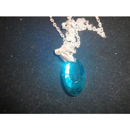 Stunning electric blue faceted oval pendant on snake chain necklace