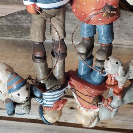 Figurine - Boy & Girl Walking dogs - Brisk Walk - Stocking Caps - Scarves