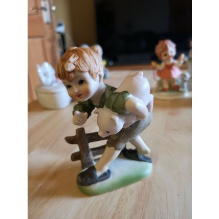 Small Ceramic Child With pig