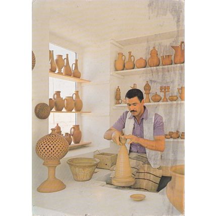 Potter Tunisia Postcard posted 1986 creased