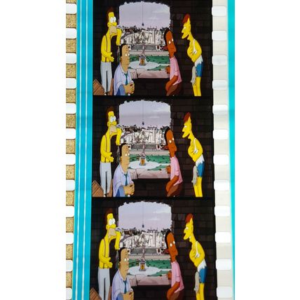 Simpsons Movie. Pk FE FE - 030D. 1 STRIP OF 5 - 35MM FILM CELLS
