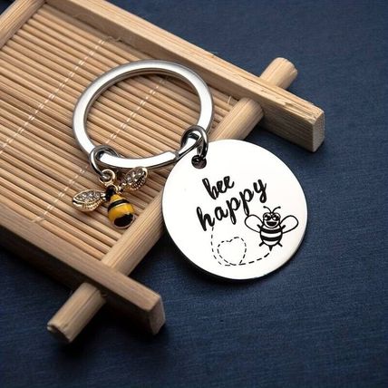 BEE HAPPY KEYRING SILVERY COLOURED