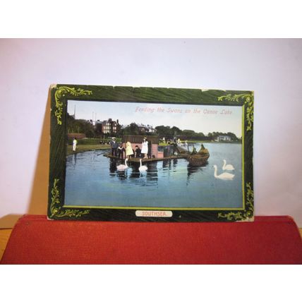 FEEDING THE SWANS, CANOE LAKE, SOUTHSEA, HAMPSHIRE used antique postcard c.1905=