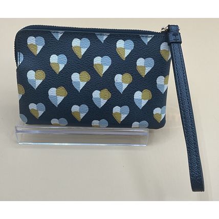 A Cute Coach Blue Zip Wristlet Leather With Heart Print