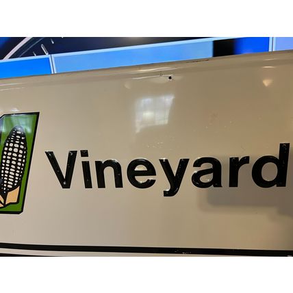 Embossed Vineyard Co-Op Dealer sign marked Grace Comm. Inc. Earth City 2-(9)6 DL