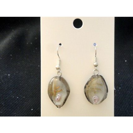 Unconventional white purple gold encased in grey twisted oval glass earring