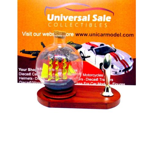 LITTLE SAILING BOAT IN A GLASS BALL ON WOOD PEN STAND,WOODEN NAUTICAL MODEL