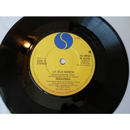 7"MADONNA 1987. LA ISLA BONITA ( REMIX) W8378, 928378-7. YELLOW LABEL.NEAR MINT
