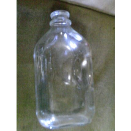 Antique glass milk bottle side indents for holding clear no cap