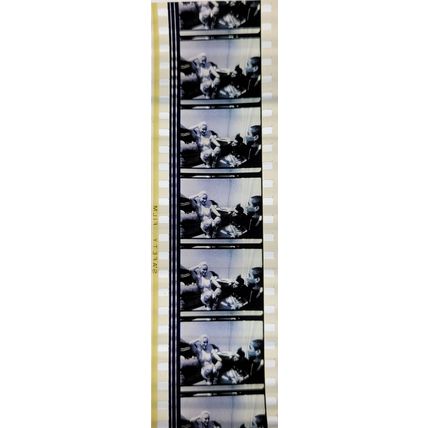 Pk GEB - W - MIX - E 0112h . 1 STRIP OF 5 - 35MM FILM CELLS. ( M )