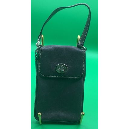 This is a very sweet Plum Color leather Vintage Coach Cellphone Case Pouch