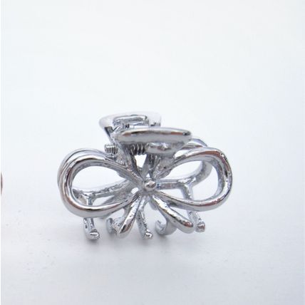 Tiny small dark silver or rose gold bow tie metal hair claw clip