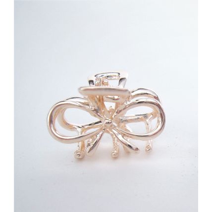 Tiny small dark silver or rose gold bow tie metal hair claw clip