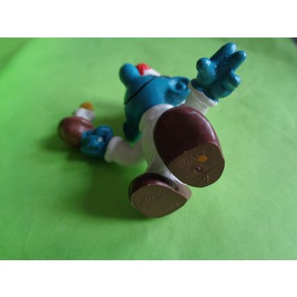 Smurf with a candle