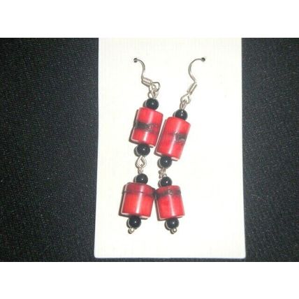 Unique noticeable pair red coral pillar with black finial long swing earrings