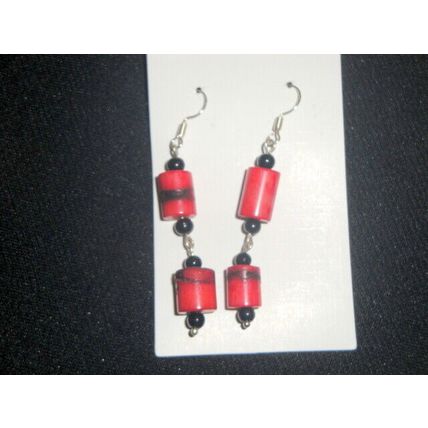 Unique noticeable pair red coral pillar with black finial long swing earrings