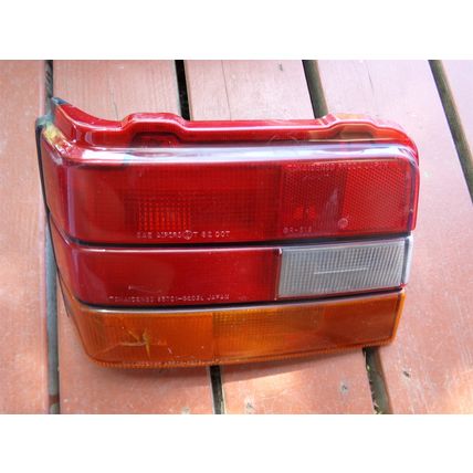 1986 87 88 Chevy Sprint LH Tail Light OEM Tokaidenso 35701-8203L 35655-8203L