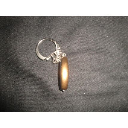 Elongated bronze dipped black glass keyring