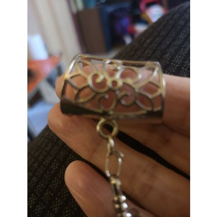 Interesting Pale Orange Glitter Pendant With Metal Detail