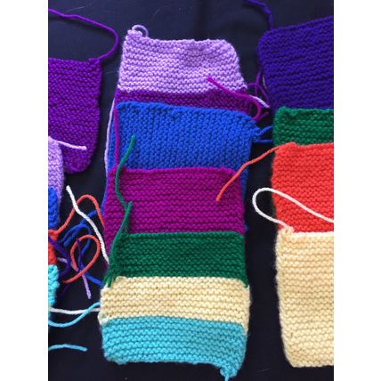 12 knitted squares in Various Colours