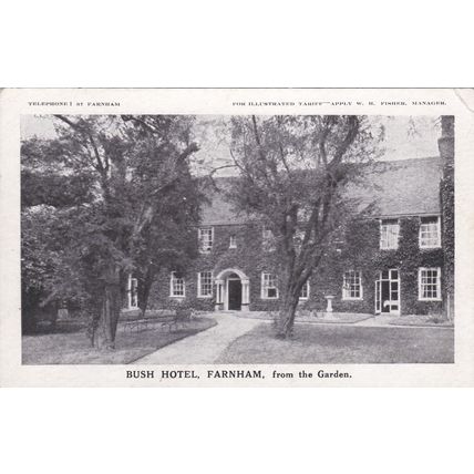 B701 FARNHAM - BUSH HOTEL FROM THE GARDEN. PRINTED POSTCARD
