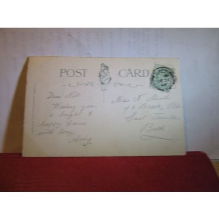A HAPPY CHRISTMAS, used antique postcard by Wildt & Kray 1909 pm angels =