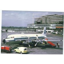 DC 6 AIRCRAFT ARIANA AT GATWICK AIRPORT. CARD NO FP 133