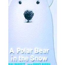 A Polar Bear In The Snow