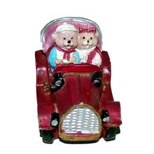 Teddy Bear Couple in a Vintage Car