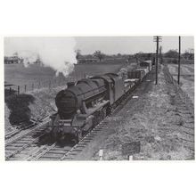 Black Eight 48698 Train Passing Mobberley Station in 1951 Railway Postcard