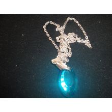 Stunning electric blue faceted oval pendant on snake chain necklace