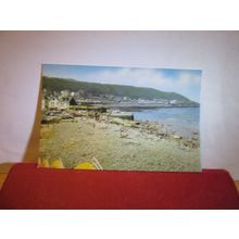 THE BEACH, WESTWARD HO!, DEVON unused postcard by J. Salmon dated 1984 =