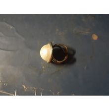 womens bronze tone adjustable ring with some rubbing to pearl top