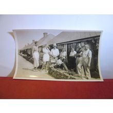 AN 8 PEOPLE GATHERING OUTSIDE UNKNOWN HOUSES small photograph =