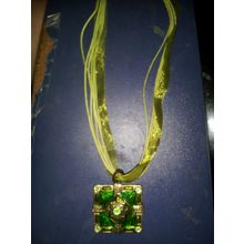 green enamel & stones on square metal piece (4x4cm) with ribbon & cord necklace