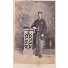 VICT. CDV PHOTO - DAPPER MAN, CANE ,PAINTED BACKGROUND BY T. ANDERSON, GLASGOW