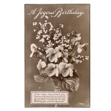 A JOYOUS BIRTHDAY .used vintage postcard 1928 postmark