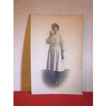 GIRL with necklace unused antique postcard by Chapman of Swansea. =