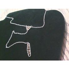Gold Tone necklace with a triangular pendant and a rectangular pendant