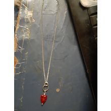 womens silver tone necklace with red heart