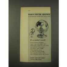 1956 Saks Fifth Avenue Globe Table Lighter Ad - It's a smoker's World